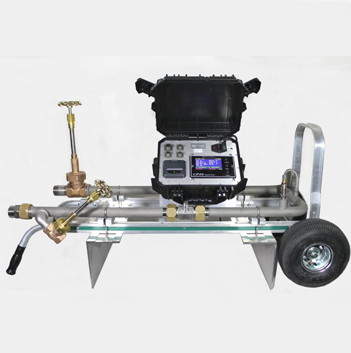 Technician installing a turbine flow meter